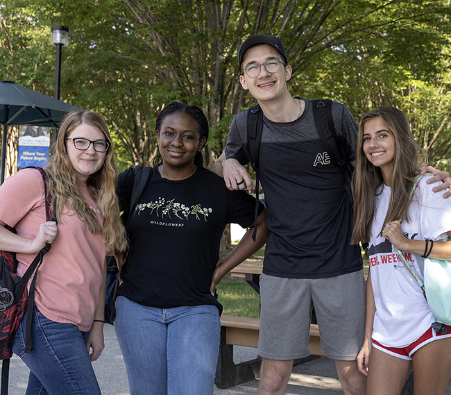 Students smiling in the Quad