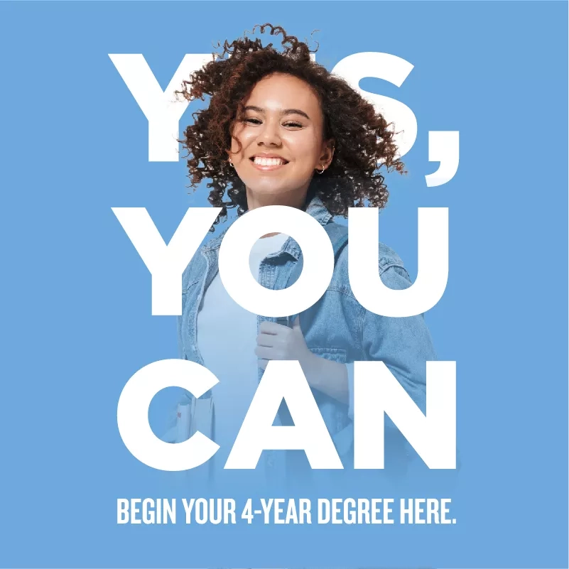 Woman smiling with a Yes, You Can banner