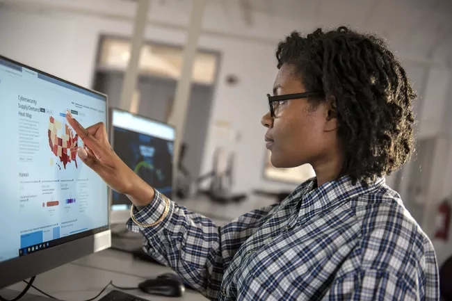 Cyber security student on computer