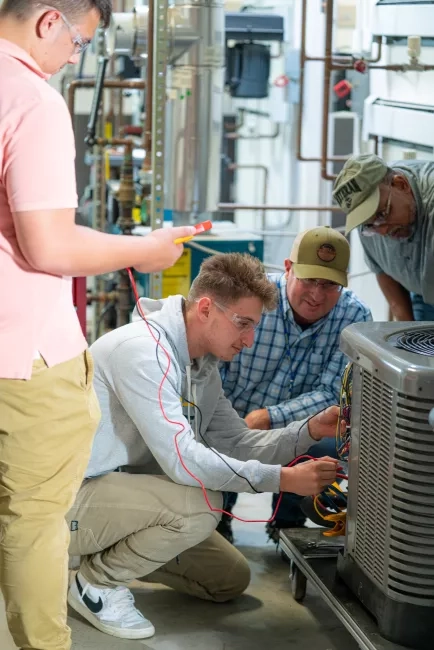 HVAC students with instructor